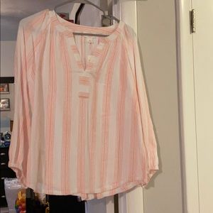 a pink and white top